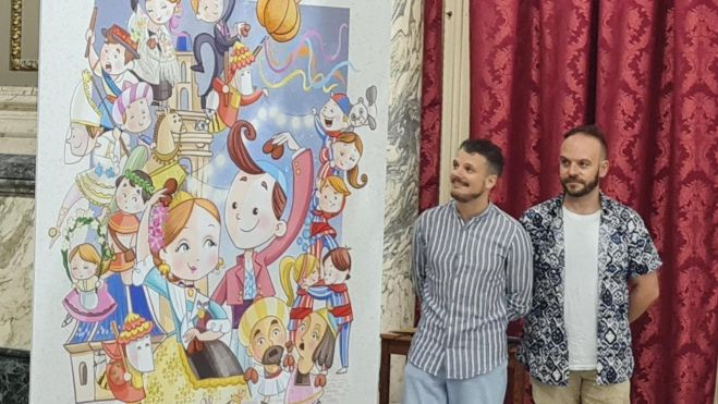 Los artistas falleros Ceballos y Sanabria, junto al boceto de la falla infantil