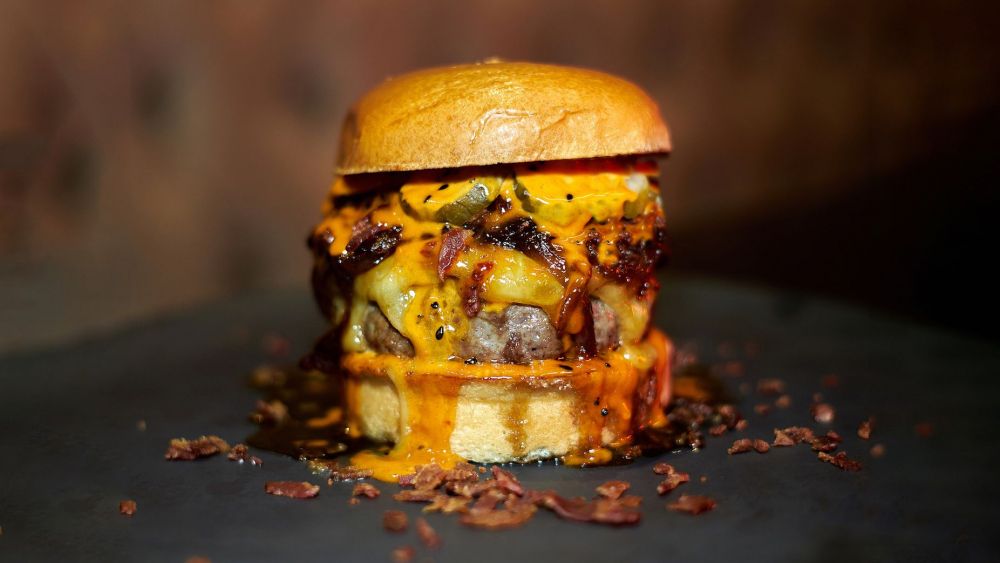 Burger Jenkins, participant a The Champions Burger