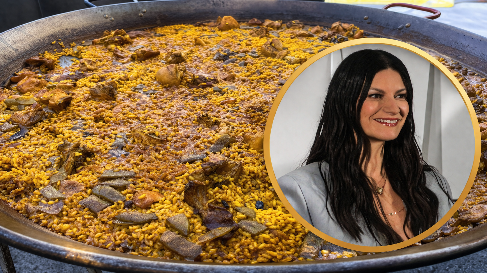 Una paella y la cantante Laura Pausini (foto de Ferdinando Traversa ) Una paella y la cantante Laura Pausini (foto de Ferdinando Traversa )